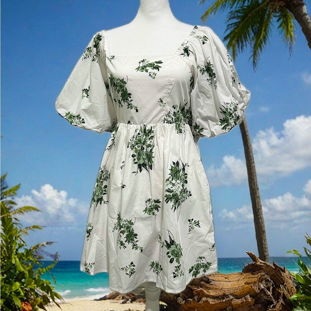 Versatile dress in white and green flowers. High quality clothing